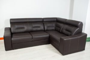 Angular Black Leather Sofa On A Neutral Background